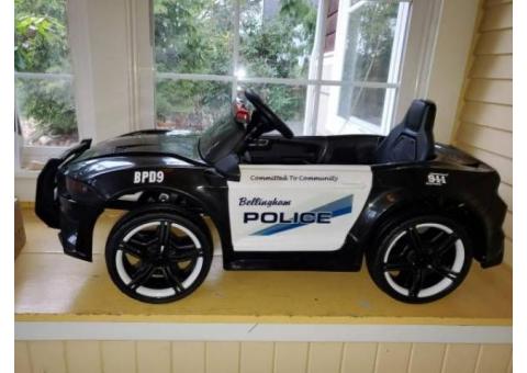 Bellingham Police kids ride on toy car with siren, lights, and more