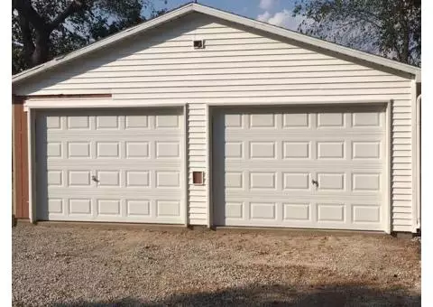 10' x 7' Garage Doors and 1 Craftsman 1/2HP opener